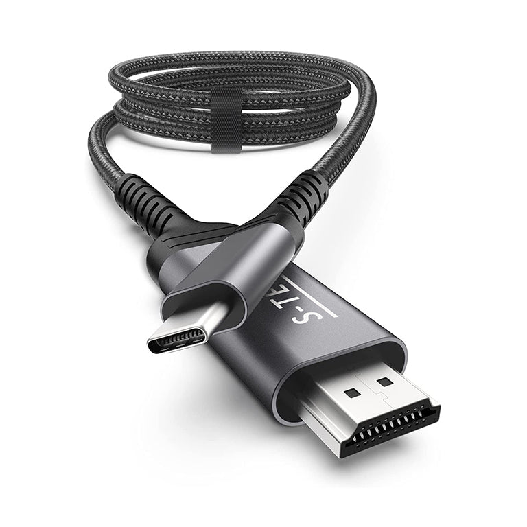 S-TEK USB-C to HDMI cable pictured with a laptop and external display.