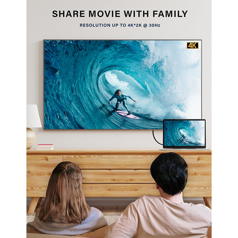 Laptop connected to an HDTV with the S-TEK DisplayPort to HDMI cable for 4K video.